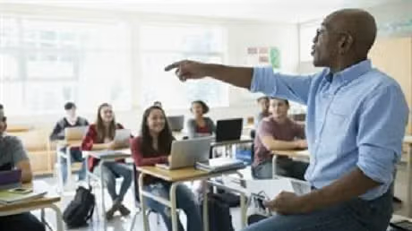 high school teacher calling on student